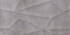 Szara cementowa płytka o geometrycznych kształtach i trójwymiarowej strukturze