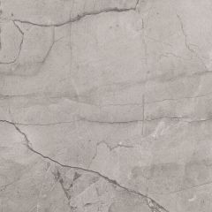 Szara płytka o powierzchni imitującej kamień na białym tle