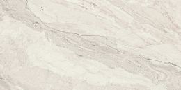Jasnobeżowa płytka gresowa o prostokątnym kształcie imitująca pęknieci na naturalnym piaskowcu. Białe tło